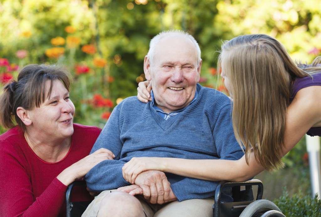 Elderly man with family