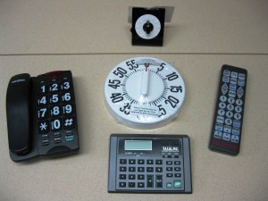 Phones, calculator and TV remote display