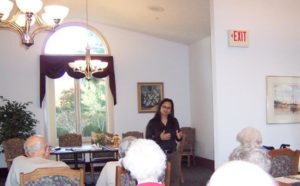 Staff making presentation at a retirement community