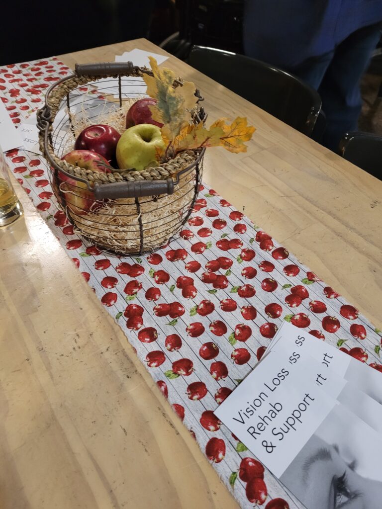a basket of apples on a table