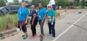 four ladies ready to run at a 5k